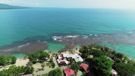 Aerial-footage-of-a-caribean-beach-in-puerto-viejo,-Costa-Rica