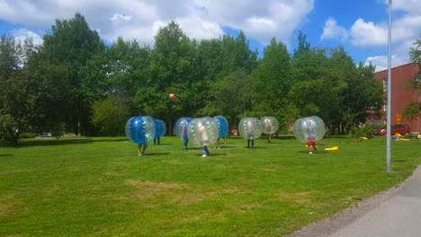 people-are-playing-football-in-big-bubble-ball