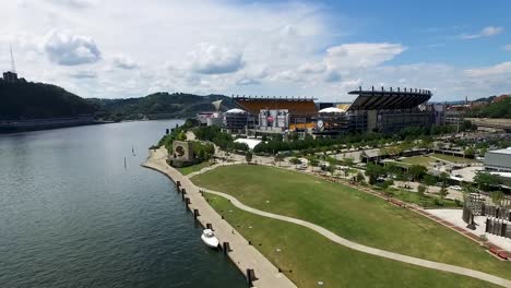 Aerial-push-into-Heinz-Field-from-the-Allegheny-River-over-the-Pittsburgh-Pennsylvania-Concept:-urban,-cityscape,-sporting,-fields,-drone