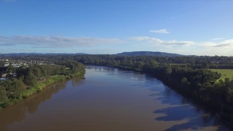 Aerial-drone-flight-over-the-Brisbane-River-at-17-Mile-Rocks