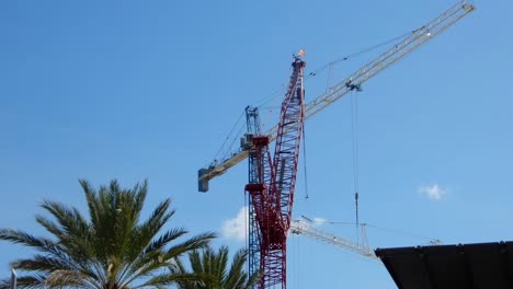 Construction-crane-at-a-busy--urban-construction-site