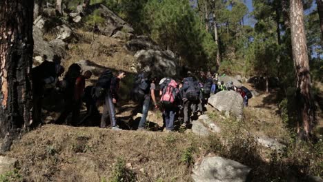 NIM-Trainees-on-their-way-to-trail,-passing-through-Himalayan-Hills-with-their-backbacks-of-essential-trekking-goods