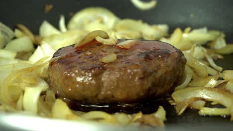 Burger-with-onions-in-a-baking-pan-preparation-for-dinner