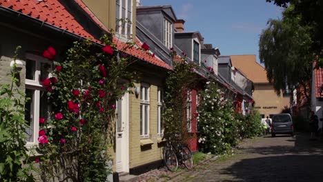 The-popular-street-MÃ¸llestigen-in-Aarhus,-Denmark-during-a-nice-summer-day