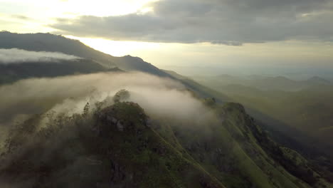 Beautiful-rotating-aerial-drone-shot-of-Adam's-Peak-in-Ella,-Sri-Lanka