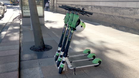 Electric-ride-share-Lime-Scooters-on-footpath-Brisbane-City