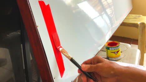 Time-Lapse---Hand-painting-signages-for-the-stores-selling-e-load