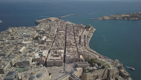 Aerial-drone-shot-flying-above-Valletta,-the-capital-city-of-Malta
