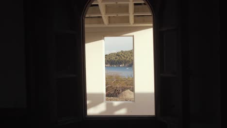 Greek-bay-through-windows-beautifully-framed