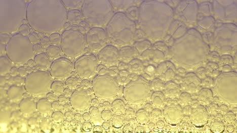 Extreme-closeup-of-soap-bubbles-that-look-like-it-was-shot-through-a-microscope