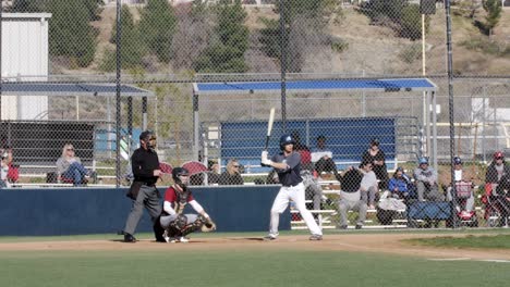 Saugus-High-School-Baseball-game,-player-at-bat-ready-to-hit-zoom-out