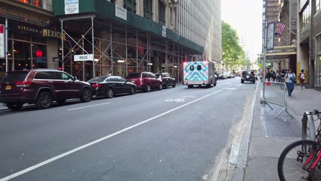 Ambulance-with-flashing-lights-rushes-through-the-streets-of-Manhattan,-Mount-Sinai-Hospital-emergency-response-vehicle