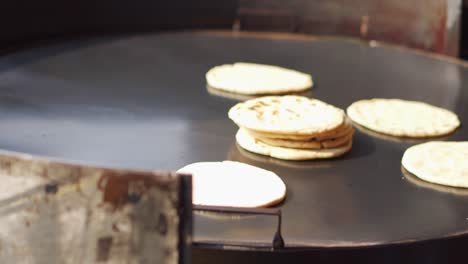 Tortillas-Being-Cooked-on-Large-Hot-Plate
