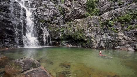 Man-swim-at-Temurun-Waterfall-in-Langkawi