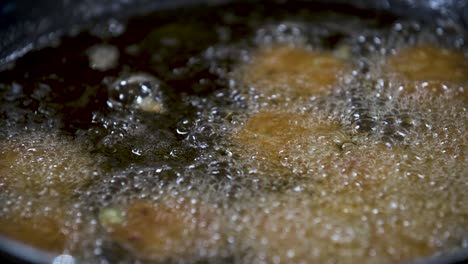 Deep-Fry-Fish-Cakes-in-Hot-Oil---Close-Up---Tod-Man-Pla