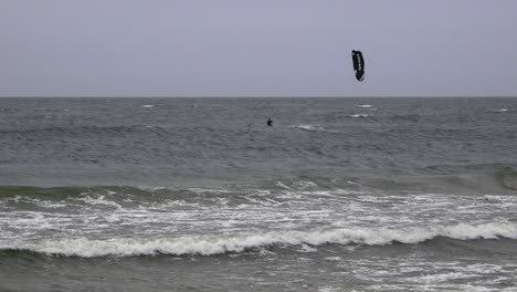 Two-man-kite-surfing-during-winter-on-Baltic-sea