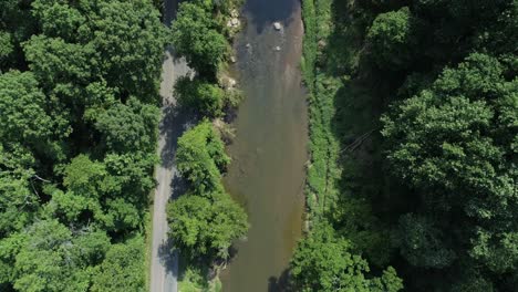An-aerial-view-of-a-road-and-a-creek
