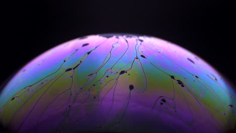 Soap-Bubble---Multicolored-Thin-Surface-Of-Bubbles-In-Black-Background