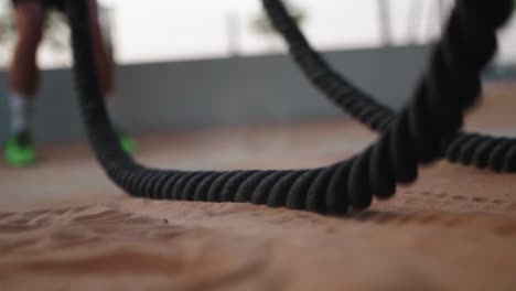 Close-up-of-ropes-in-sand