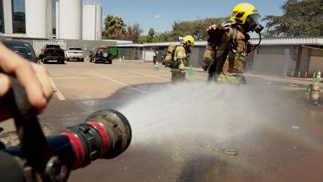 Firefighter-decontaminates-after-responding-to-a-fire-at-the-Santa-Luzia-Hospital-COVID-19-treatment-facility