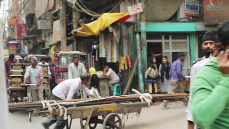every-day-routine-hustle-bustle-view-of-the-poverty-stricken,-densely-populated-area-of-Chandni-Chowk,-Delhi,-India-in-asia