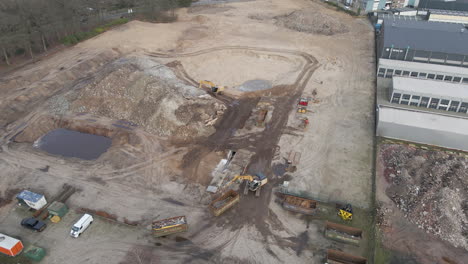 Aerial-of-excavators-working-on-construction-site