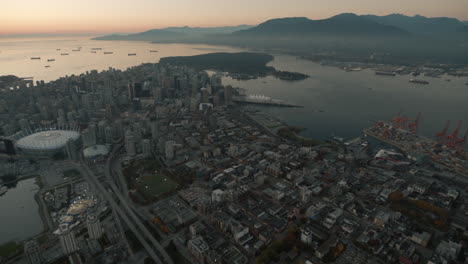 Aerial-wide-shot-of-Vancouver-Eastside-and-docks,-Dusk