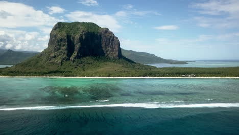 drone-shot-above-going-backward-and-revealing-the-Morne-brabant-mountain-in-Mauritius-island