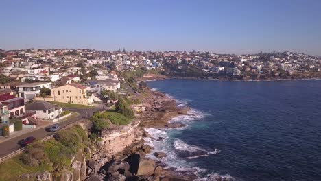 Aerial-drone-flying-over-Australian-coastal-houses-in-Sydney