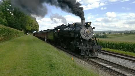 Steam-Train-Pulling-out-of-Picnic-Area-Along-Amish-Farmlands
