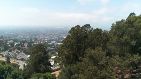 Berkeley-hills-aerial-over-trees-to-reveal-UC-Berkeley-Northern-California