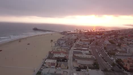 A-flight-over-a-Southern-California-Beach-at-sunset