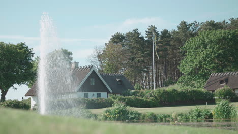 A-shot-of-typical-Swedish-houses-on-the-countryside-in-an-idyllic-environment