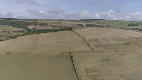 Forward-tracking-aerial-of-St-Catherine's-Chapel-in-the-heart-of-West-Dorset,-near-the-town-of-Weymouth