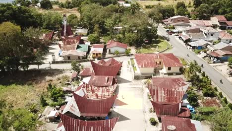 Drone-flying-over-traditional-Batak-Village-on-Samosir-Island-in-Lake-Toba