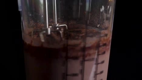 Slow-motion-shot-of-miking-a-cacao-cream-in-slow-motion