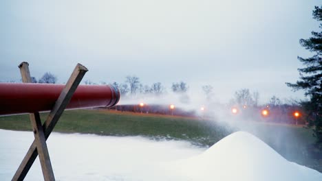 Snow-cannon-makes-artificial-snow-at-night