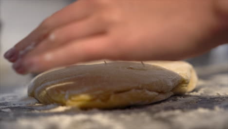 Preparing-home-made-pasta-dough-with-hands