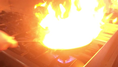 Footage-Of-A-Cook-Making-Vegetables-In-A-Pan-Flampe