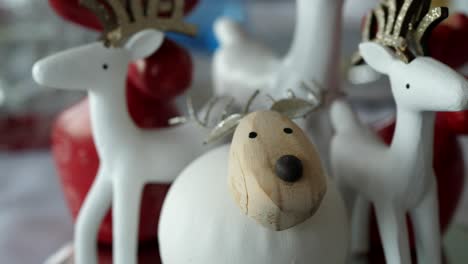 Pan-Around-Reindeer-And-Sheep-Christmas-Decorations-Sitting-On-Table