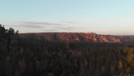 AERIAL:-Famous-Sandstone-Rock-appears-out-of-forest-in-Saxon-Siwtzerland