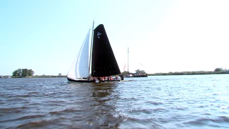 sailing-with-classic-boats-on-inhore-water-Friesland-The-Netherlands