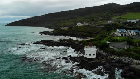 Lighthouse-coast-ocean-sea---Stirling-Point,-Bluff,-New-Zealand---Aerial-Drone