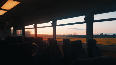 inside-shot-of-empty-train-at-sunset