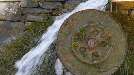 Falling-water-rotates-a-water-wheel