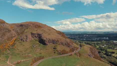 Holyrood-park-in-sunny-day-with-few-clouds