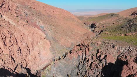 Aerial-view-of-popular-giant-cactus-trekking-trail-canyon-near-San-Pedro-de-Atacama-in-the-Atacama-Desert,-northern-Chile,-South-America