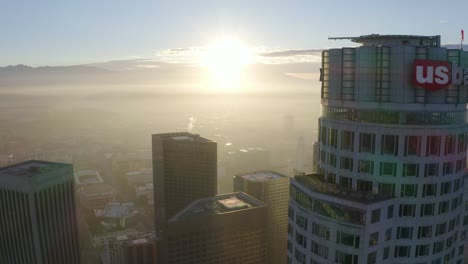 Great-aerial-fly-by-US-Bank-skyscraper-in-downtown-Los-Angeles-during-sunrise