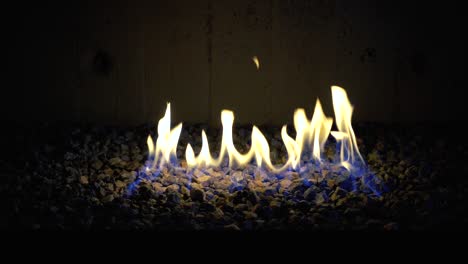 Different-angles-of-artificial-fire-burning-giving-a-modern,-rusty,-ambiental-vibe