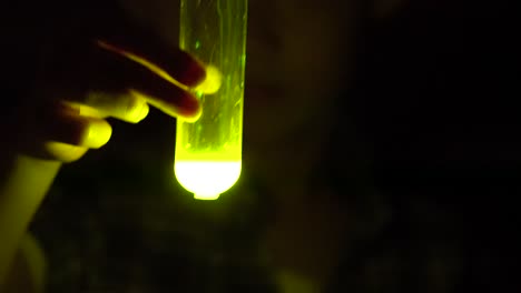 A-lab-tube-glowing-in-the-dark